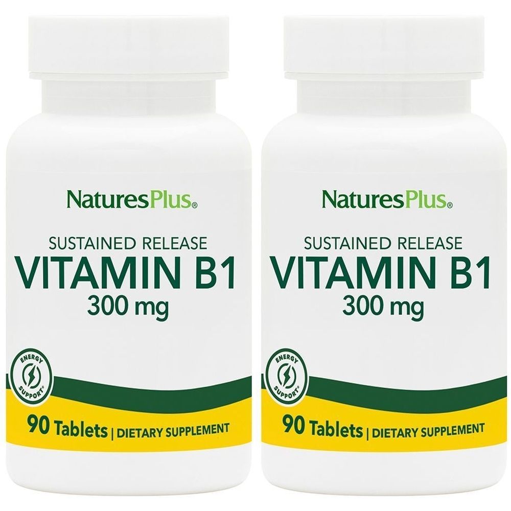 Due flaconi bianchi di vitamina B1. Scritta: NaturesPlus, vitamina B1 300 mg, 90 compresse. Striscia gialla.