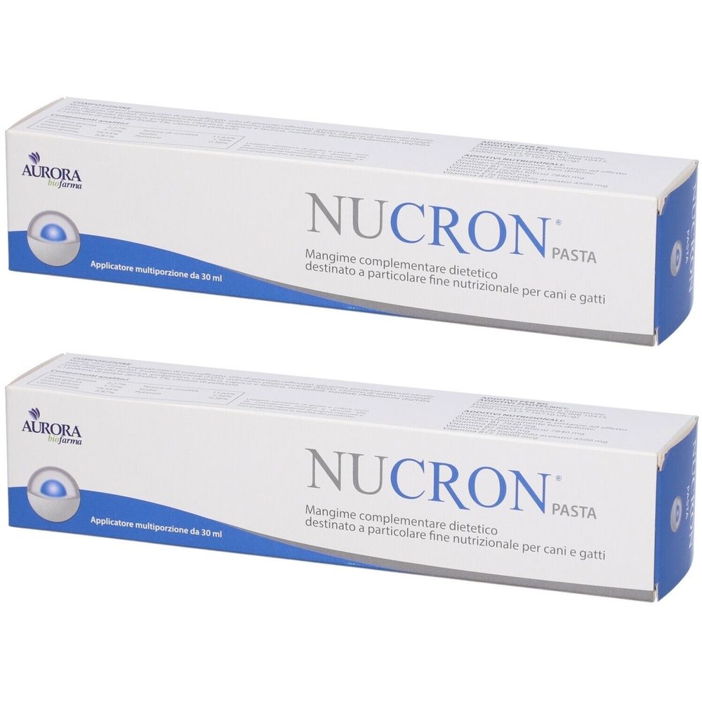 Due scatole bianche con testo blu. Ogni scatola mostra "NUCRON PASTA" e "AURORA". Testo: Alimento complementare per cani e gatti.