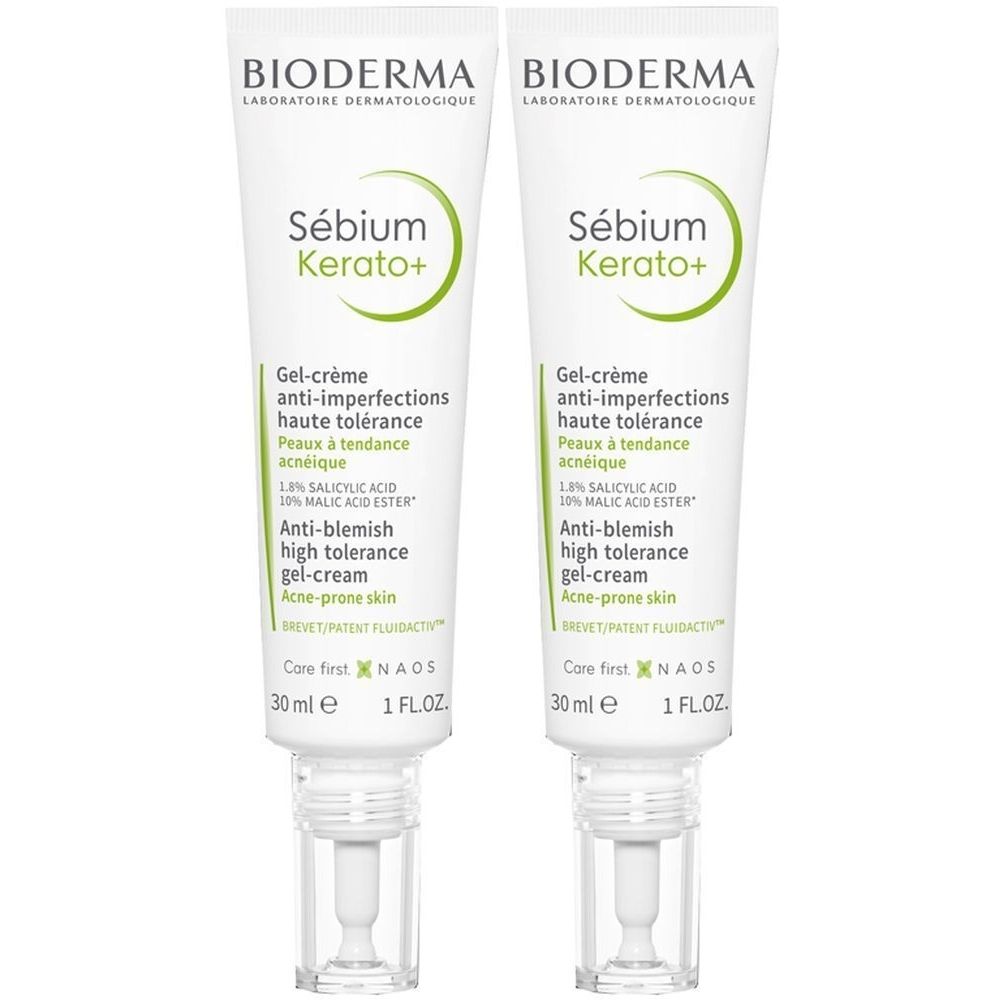 Due tubi di crema BIODERMA Sebium Kerato+. Tubi bianchi con scritte verdi. Testo: Anti-imperfezioni, pelle acneica, 30 ml.