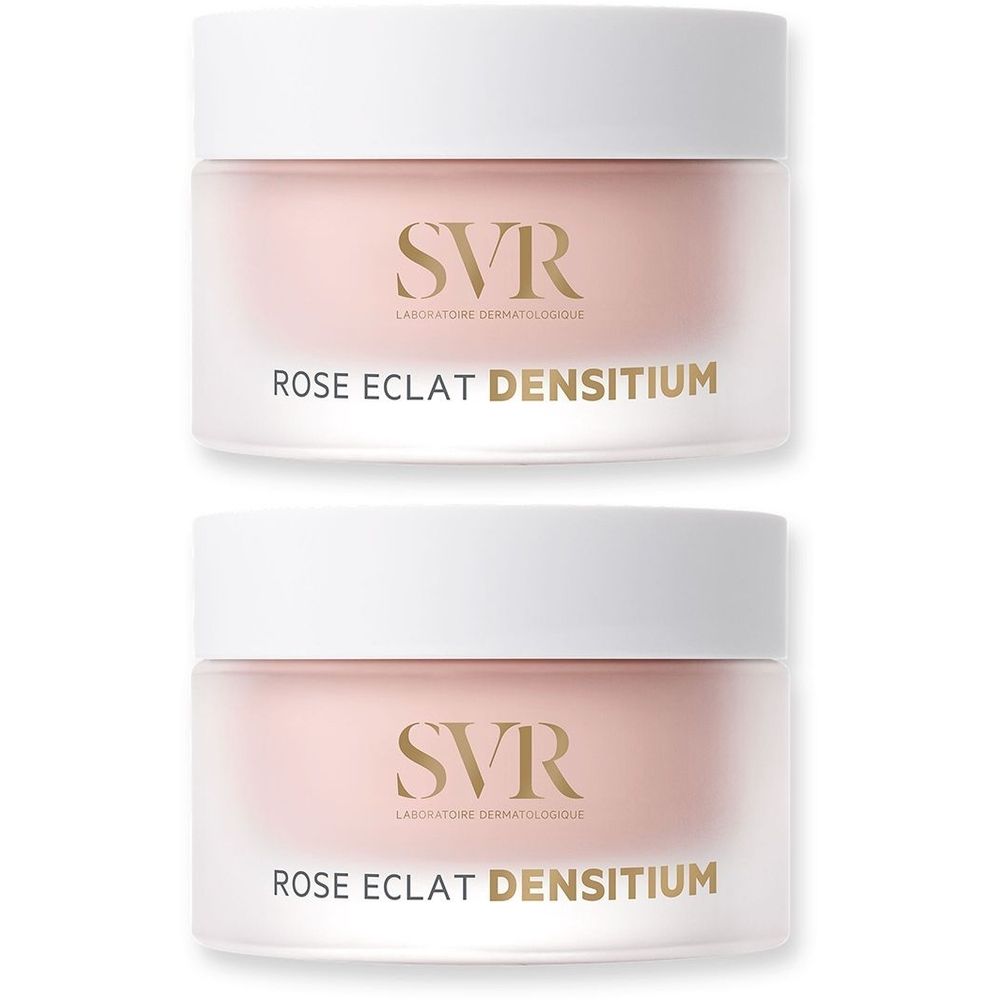 Due vasetti SVR Densitium Rose Eclat. Coperchi bianchi, contenuto rosa. Scritta dorata SVR e nome del prodotto.