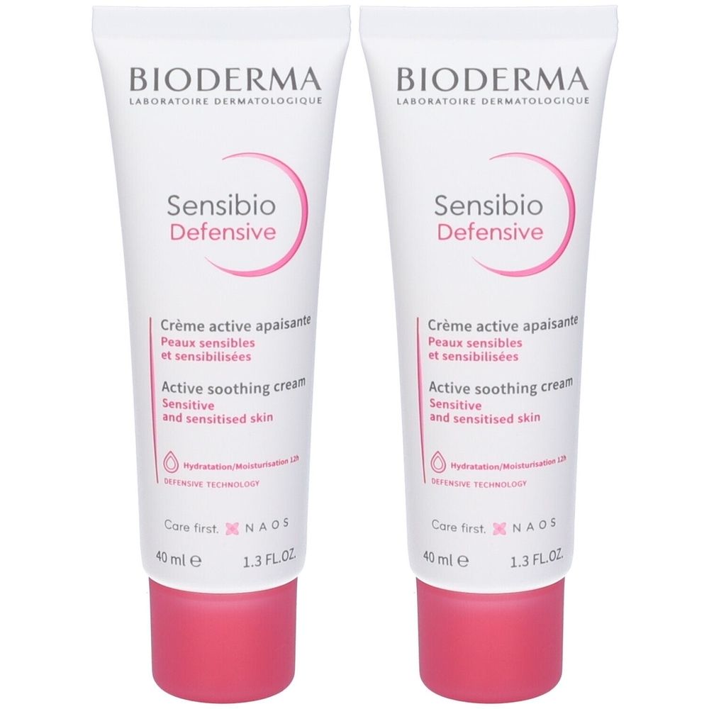 Due tubi di crema BIODERMA Sensibio Defensive. Tubi bianchi con dettagli rosa e scritte. Active soothing cream.