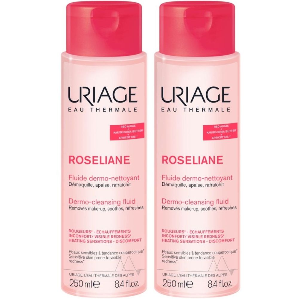 Due flaconi di lozione detergente Roséliane. Flaconi rosa con tappi rossi. Testo: URIAGE, Roséliane, lozione dermo-detergente.
