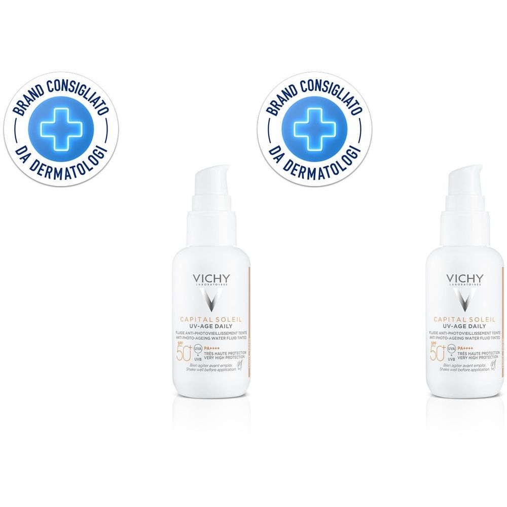Due flaconi bianchi con dosatore. Scritta: VICHY, CAPITAL SOLEIL UV-AGE DAILY, SPF 50. Due loghi rotondi: Brand Consigliato Da Dermatologi.
