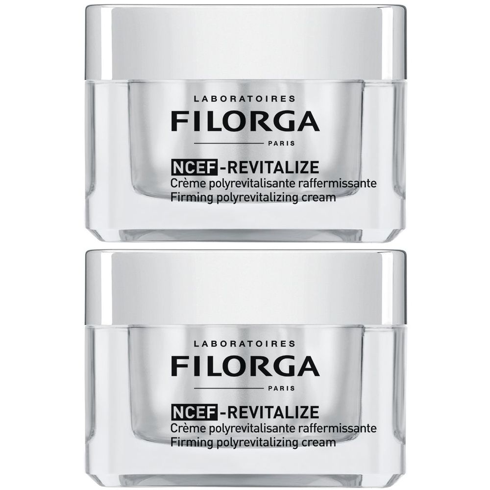 Due vasetti di crema con coperchi. Scritta: LABORATOIRES FILORGA PARIS, NCEF-REVITALIZE, Crème polyrevitalisante raffermissante, Firming polyrevitalizing cream.
