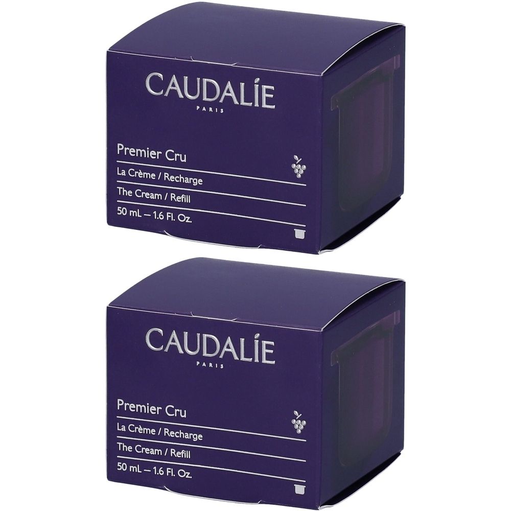 Due scatole quadrate viola scuro. Scritta: CAUDALIE PARIS, Premier Cru, La Crème/Recharge, The Cream/Refill, 50 ml - 1.6 Fl. Oz.