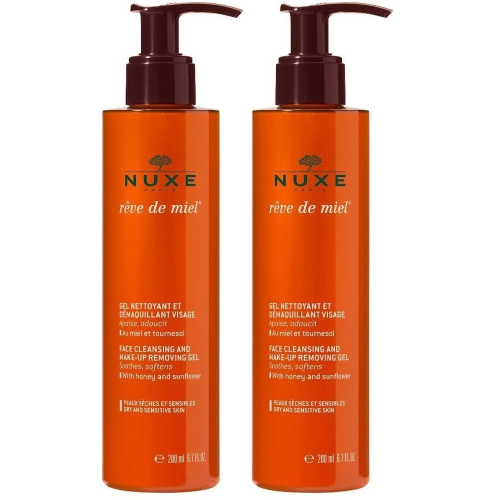 Due flaconi arancioni con dosatori marroni. Scritta: Nuxe Rêve de Miel, Gel Nettoyant et Demaquillant Visage.