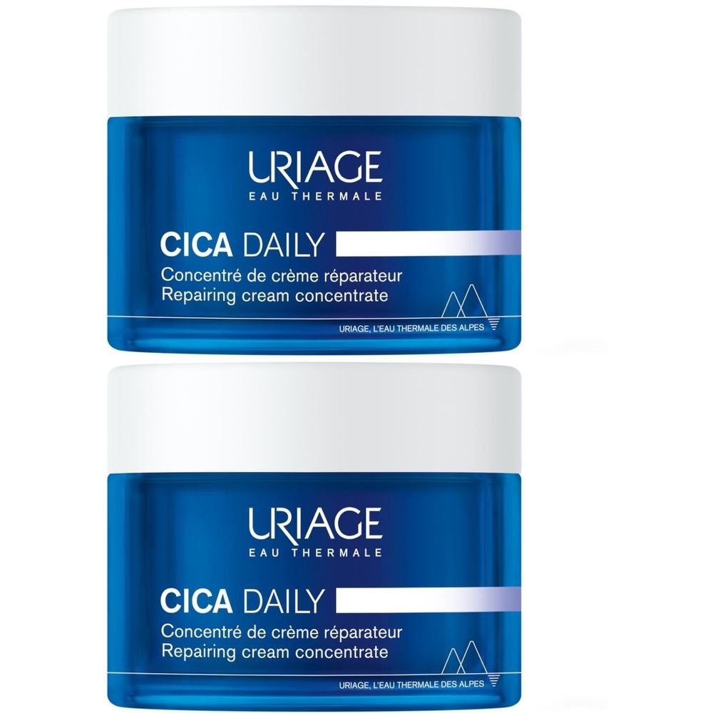 Due vasetti di crema blu con coperchi bianchi. Scritta: URIAGE, CICA DAILY, Concentré de crème réparateur, Repairing cream concentrate.