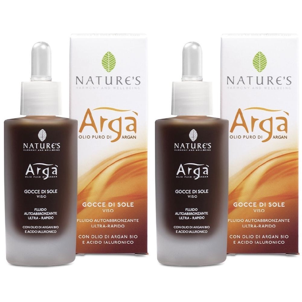 Due flaconi di liquido marrone con contagocce e due scatole. Scritta: Arga, Gocce di Sole VISO.