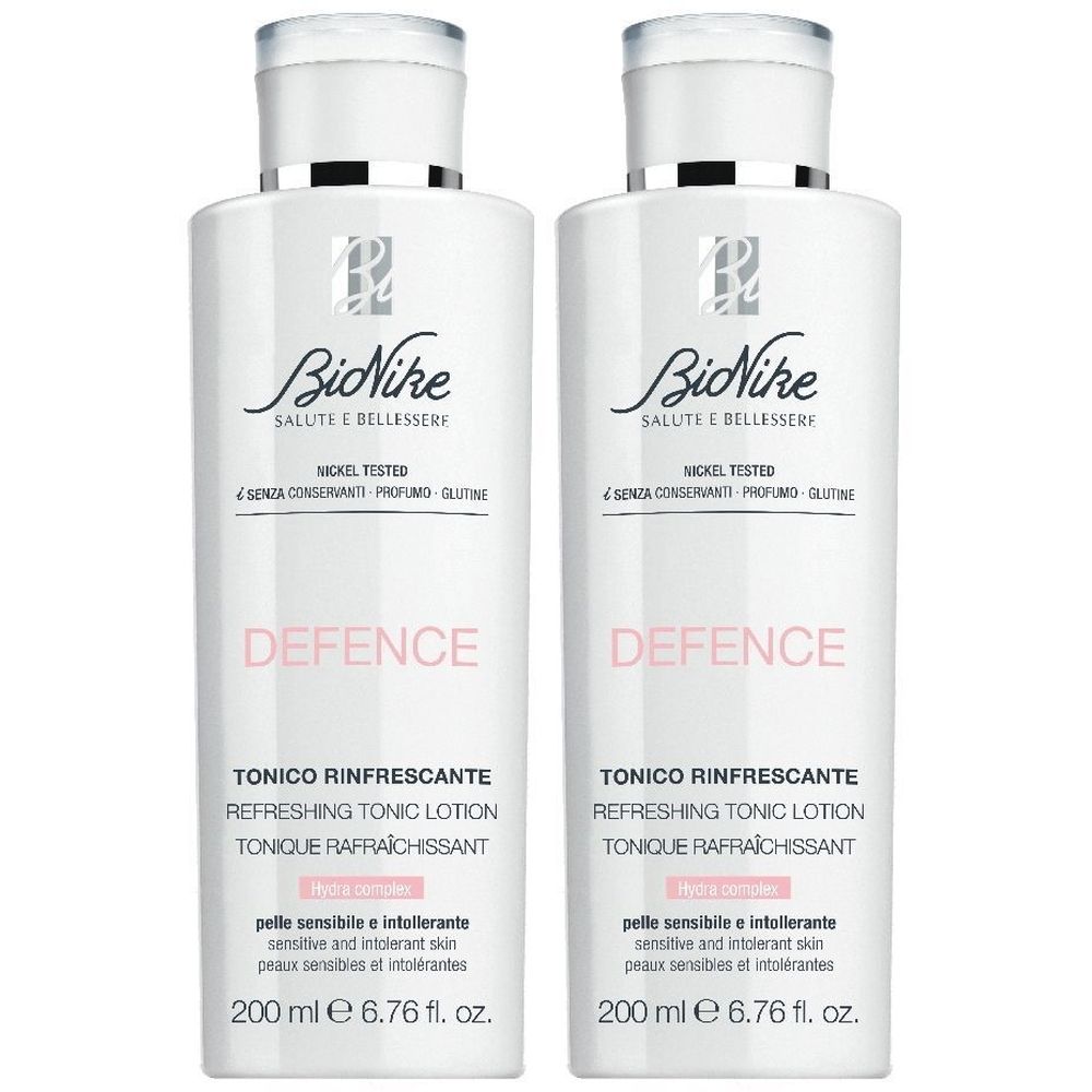 Due flaconi bianchi con tappi argentati. Scritta: BioNike Defence, Tonico Rinfrescante. 200 ml.