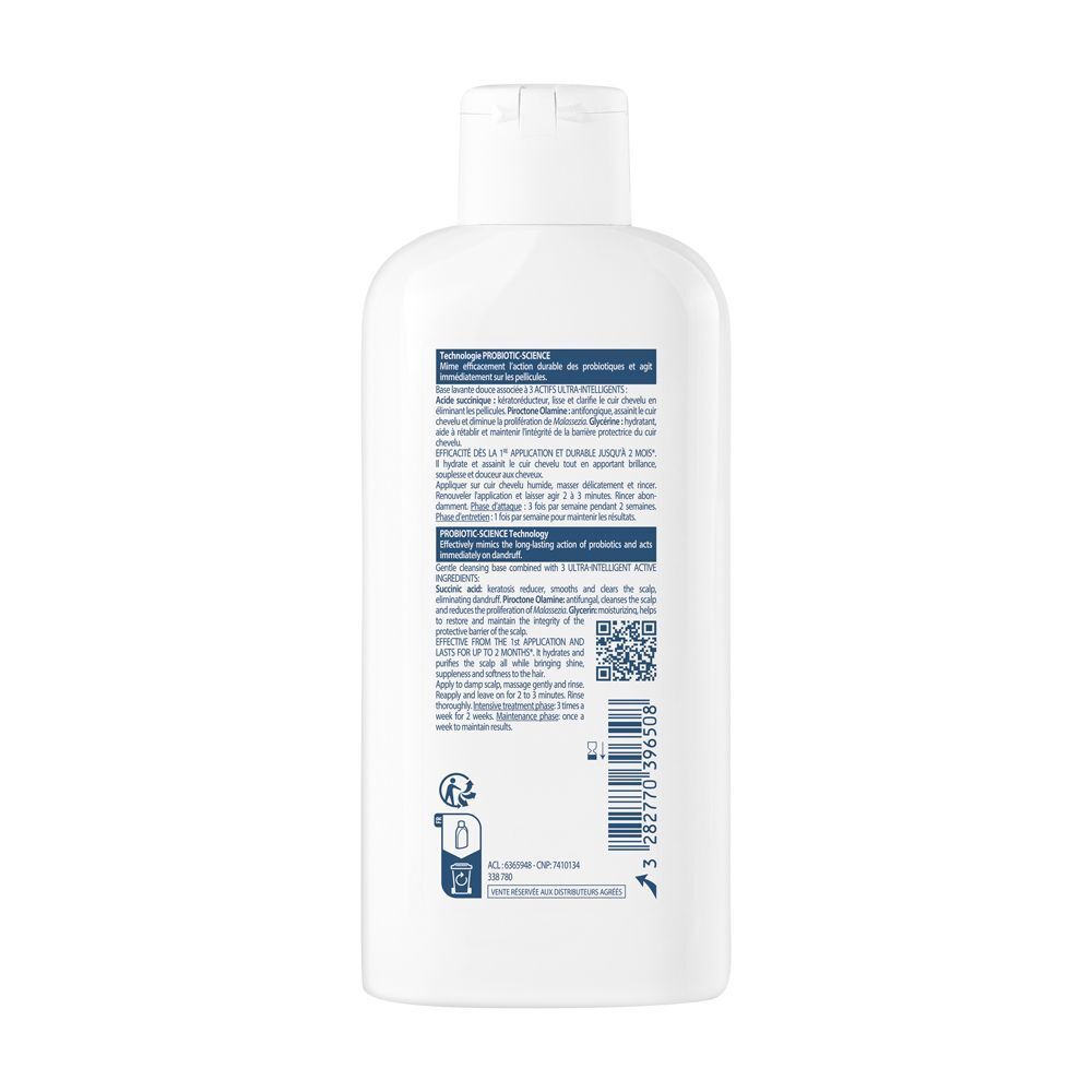 Retro di un flacone di shampoo bianco. Testo e codice QR.