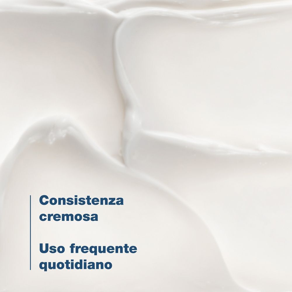 Primo piano di una sostanza cremosa. Testo: Consistenza cremosa, Uso frequente quotidiano.