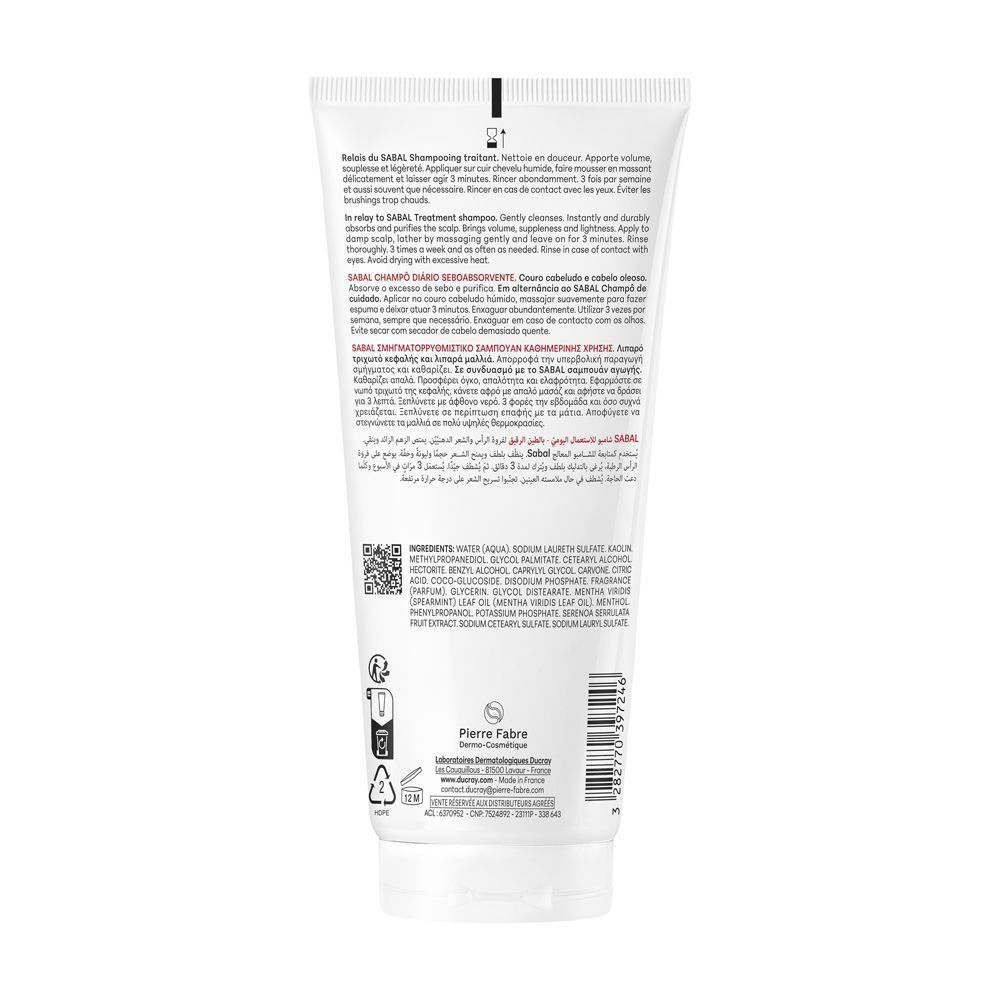 Retro di un tubo di shampoo. Testo e ingredienti visibili.