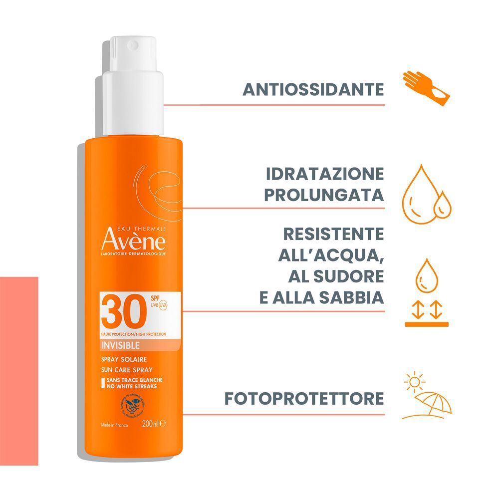 Flacone spray arancione. Scritta: Eau Thermale Avène, SPF 30, Invisible. Testo con caratteristiche.