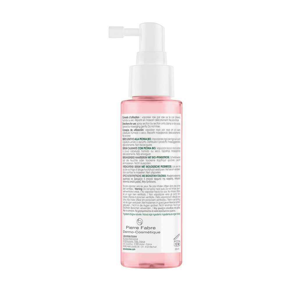 Flacone con vaporizzatore. Liquido rosa. Testo sul retro del flacone. Logo del produttore.