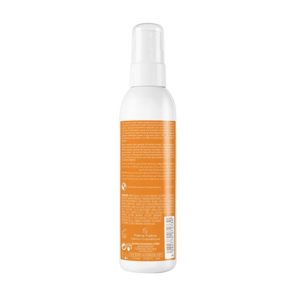 Flacone spray bianco con etichetta arancione. Testo in francese. Retro con informazioni sul prodotto e codice a barre.