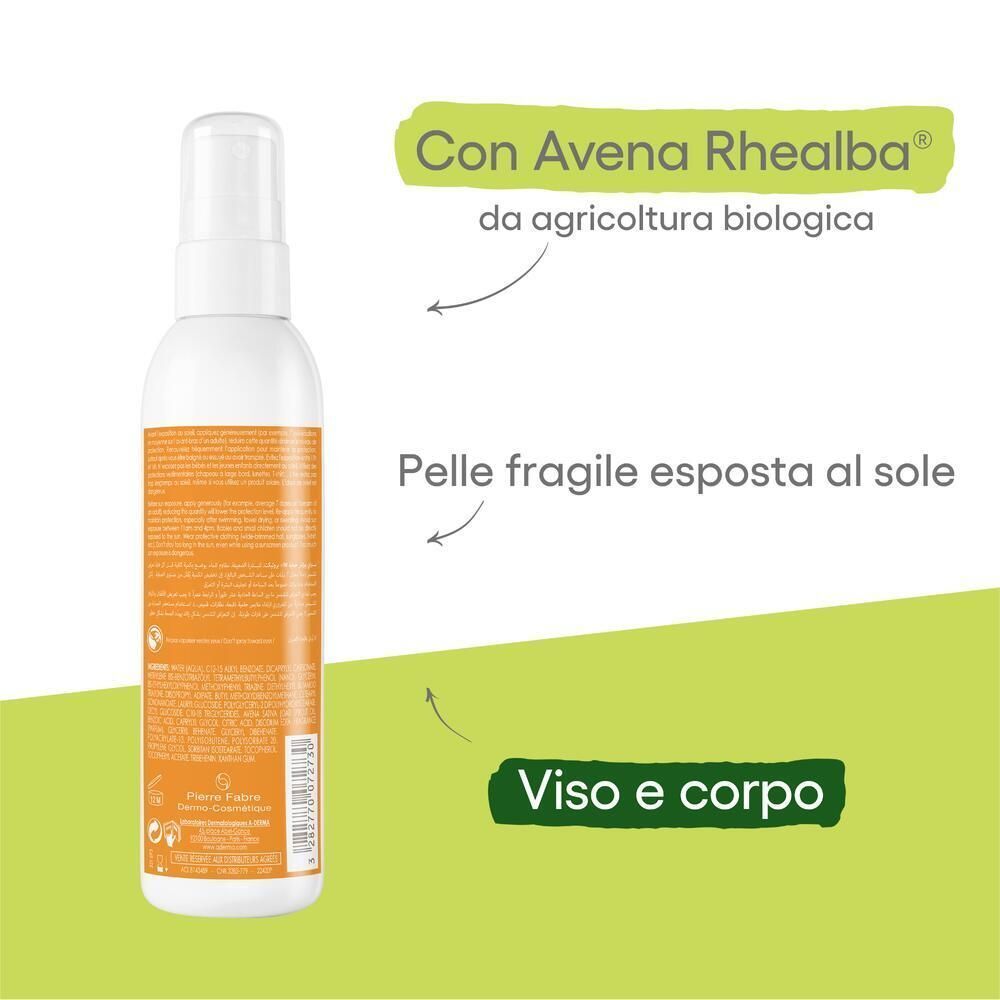 Flacone spray bianco con etichetta arancione. Testo in italiano. Con Avena Rhealba da agricoltura biologica. Per pelle esposta al sole.