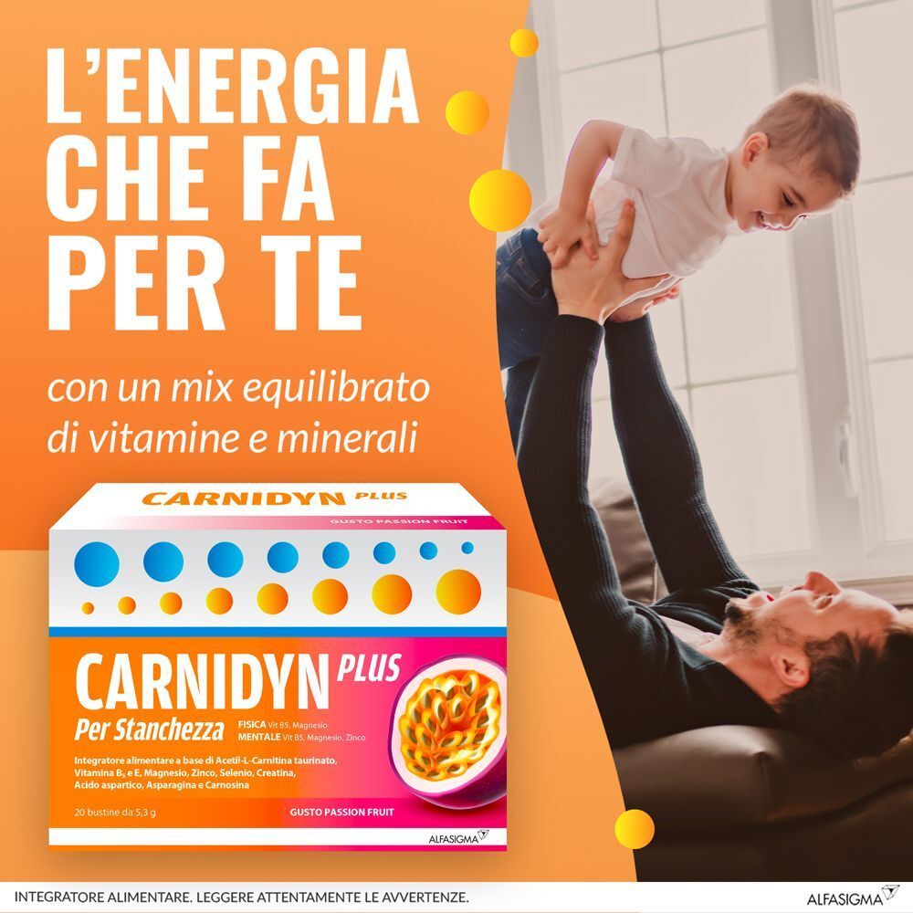 Pubblicità con padre e figlio. Confezione Carnidyn Plus. Testo: 'L'energia che fa per te'.