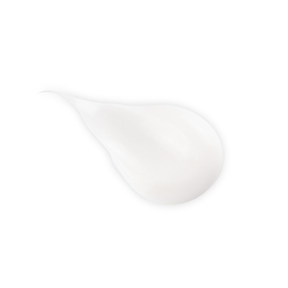 Una goccia di balsamo bianco Klorane su sfondo bianco.