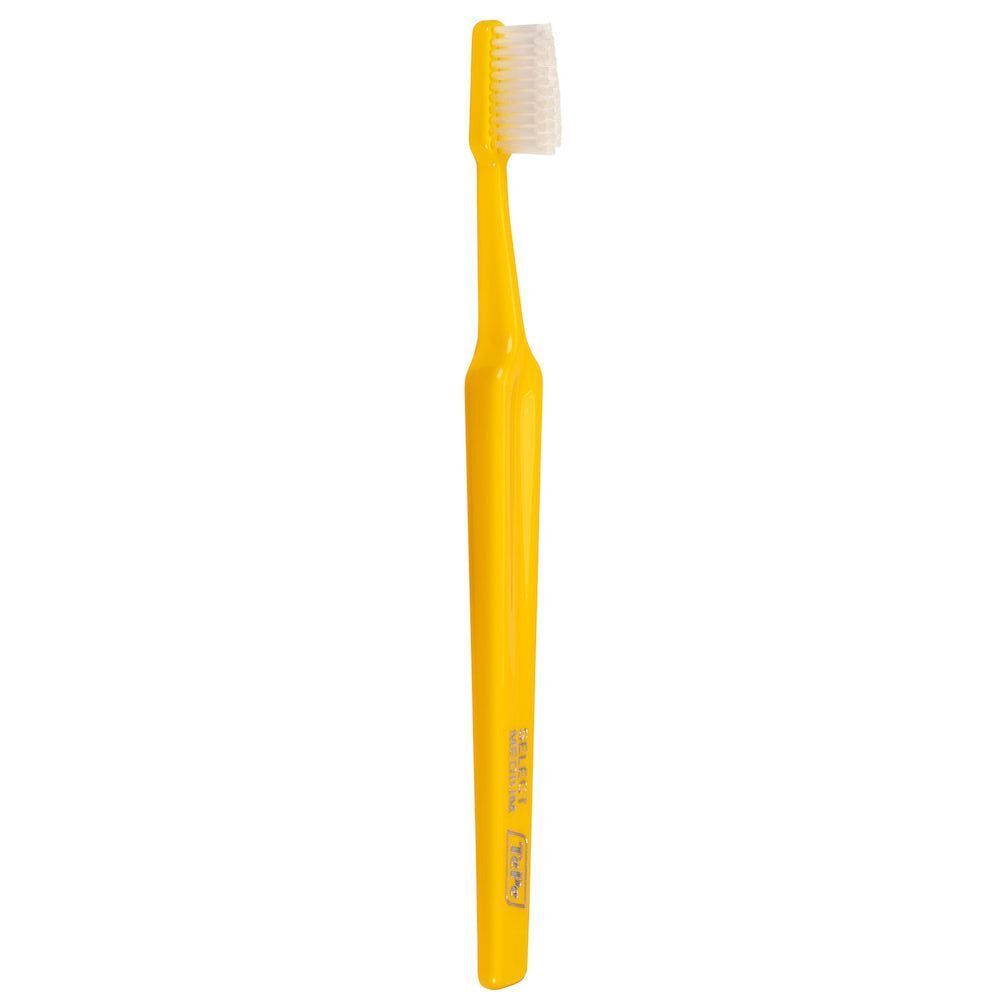 Spazzolino TePe Select Medium giallo con testina bianca.