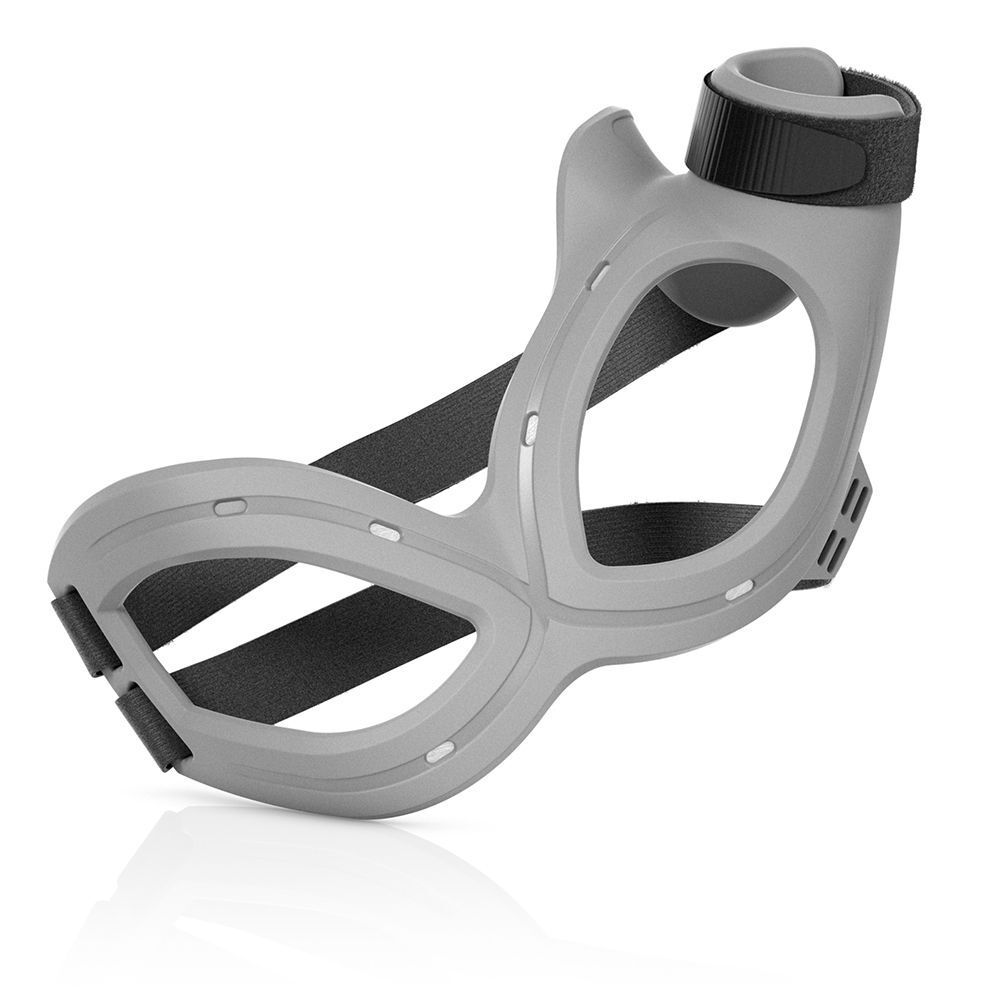 Dispositivo ortesi polso grigio con cinghie e chiusura in velcro, isolato su sfondo bianco.