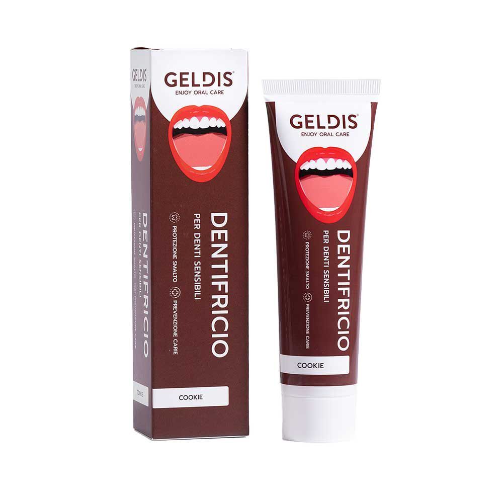 Un tubetto e una scatola di dentifricio per denti sensibili, gusto cookie.