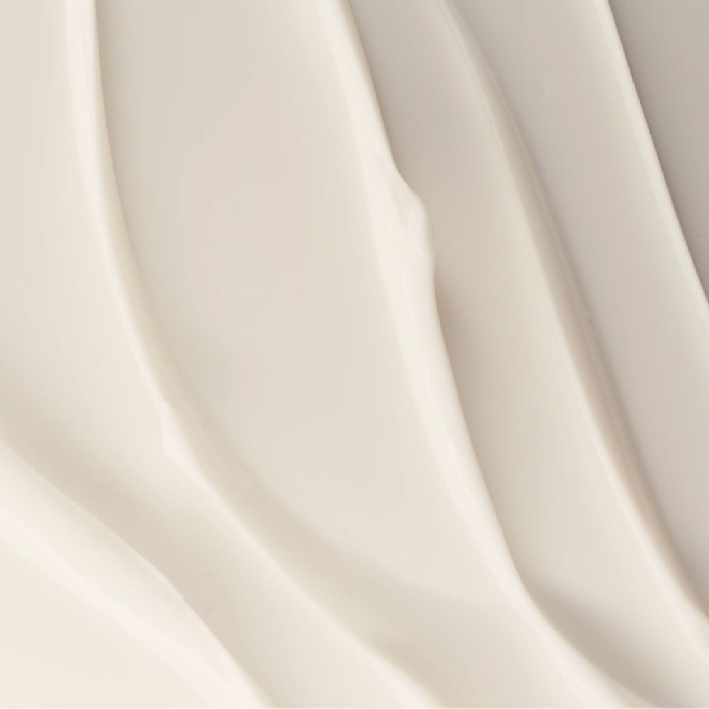 Texture astratta di crema bianca a forma di onde.