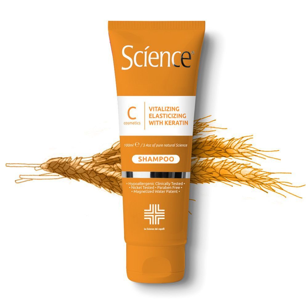 Un tubo di Science Shampoo con Cheratina, circondato da spighe di grano.