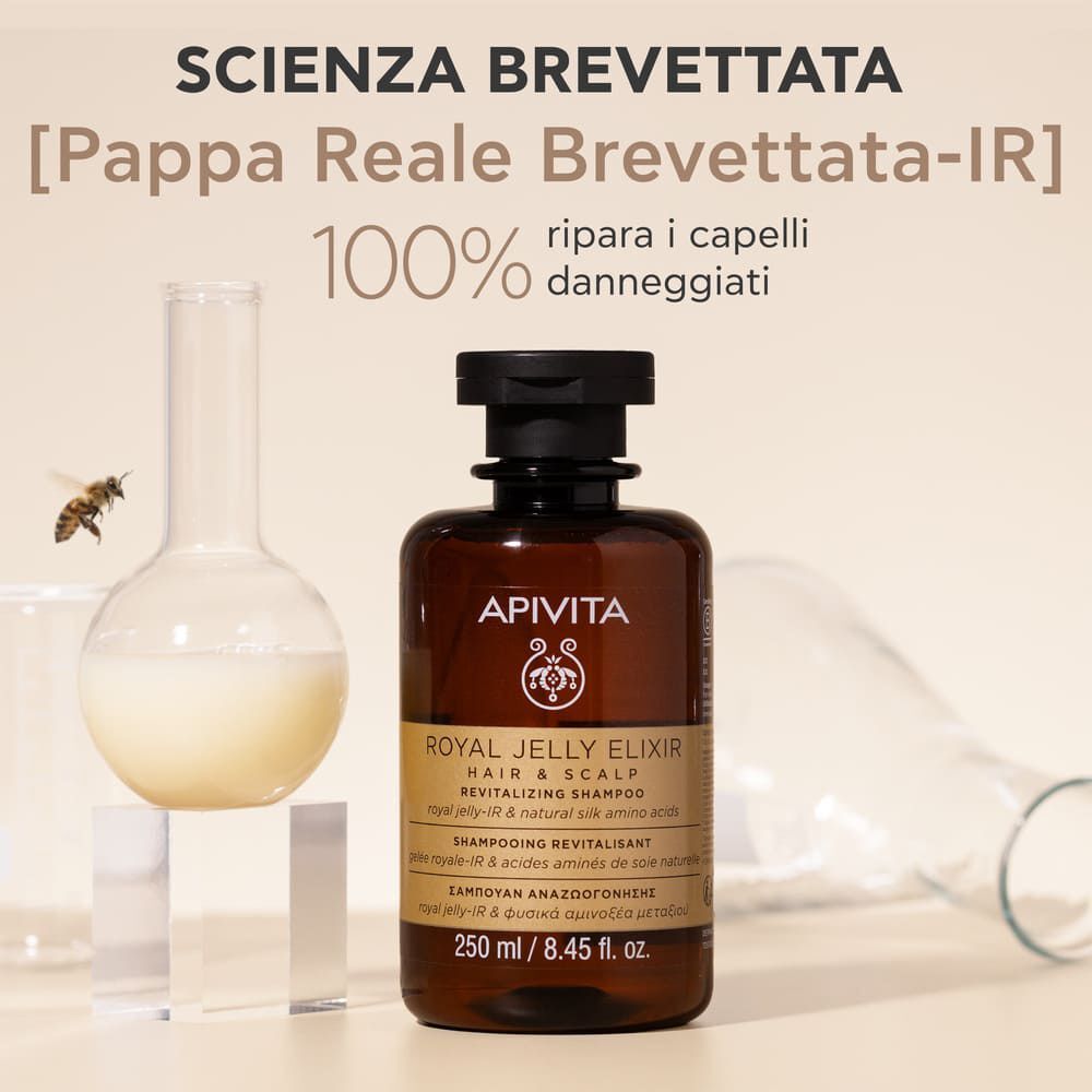 Shampoo Apivita Royal Jelly Elixir in ambiente di laboratorio con beute.