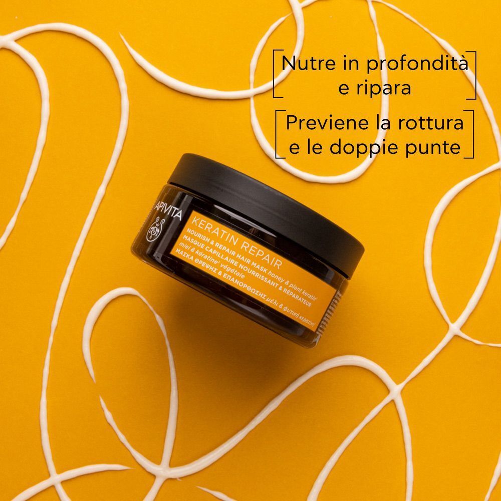 Maschera capelli APIVITA Keratin Repair su sfondo giallo con linee bianche.