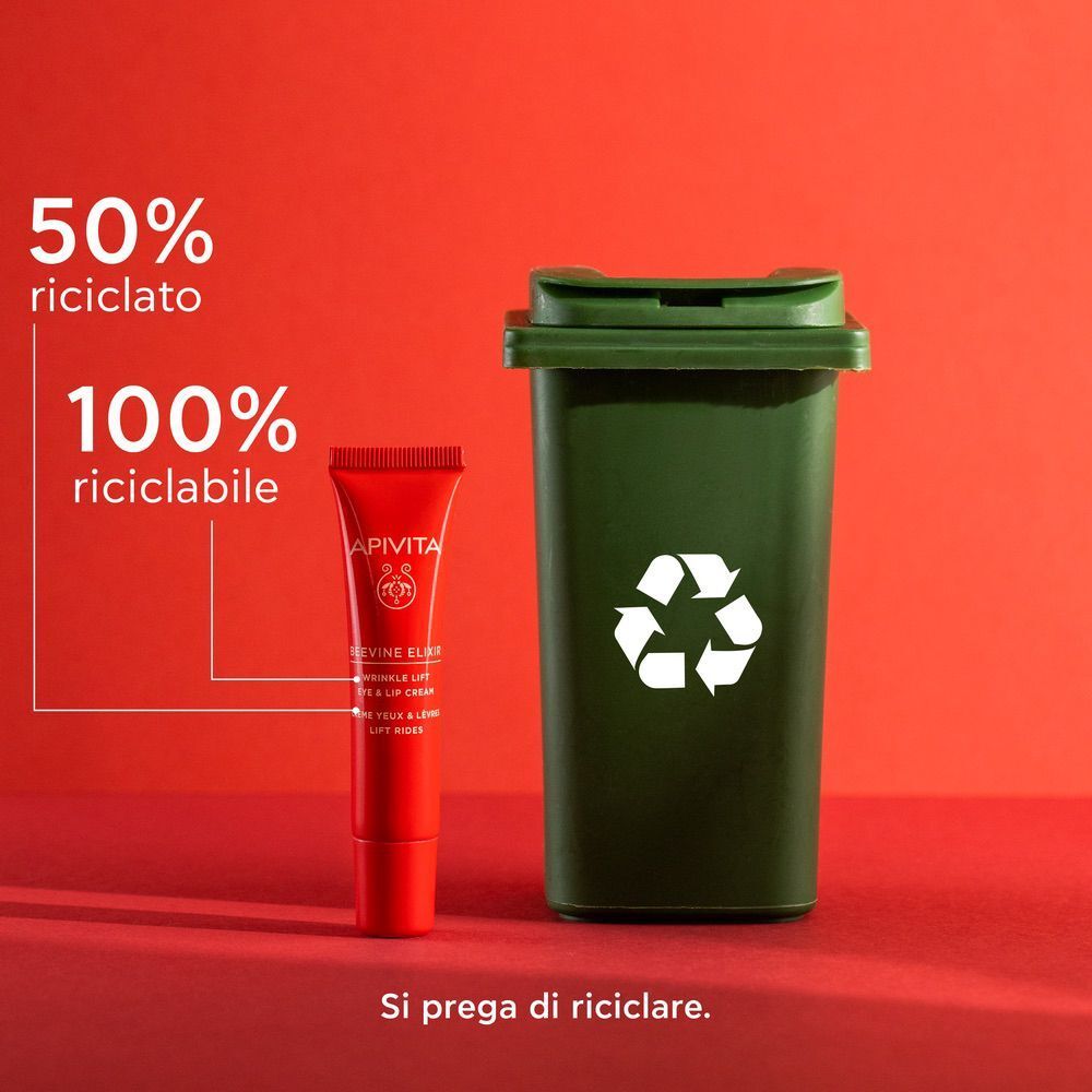 Crema Apivita Beevine Elixir accanto a un bidone di riciclaggio, 50% riciclato.