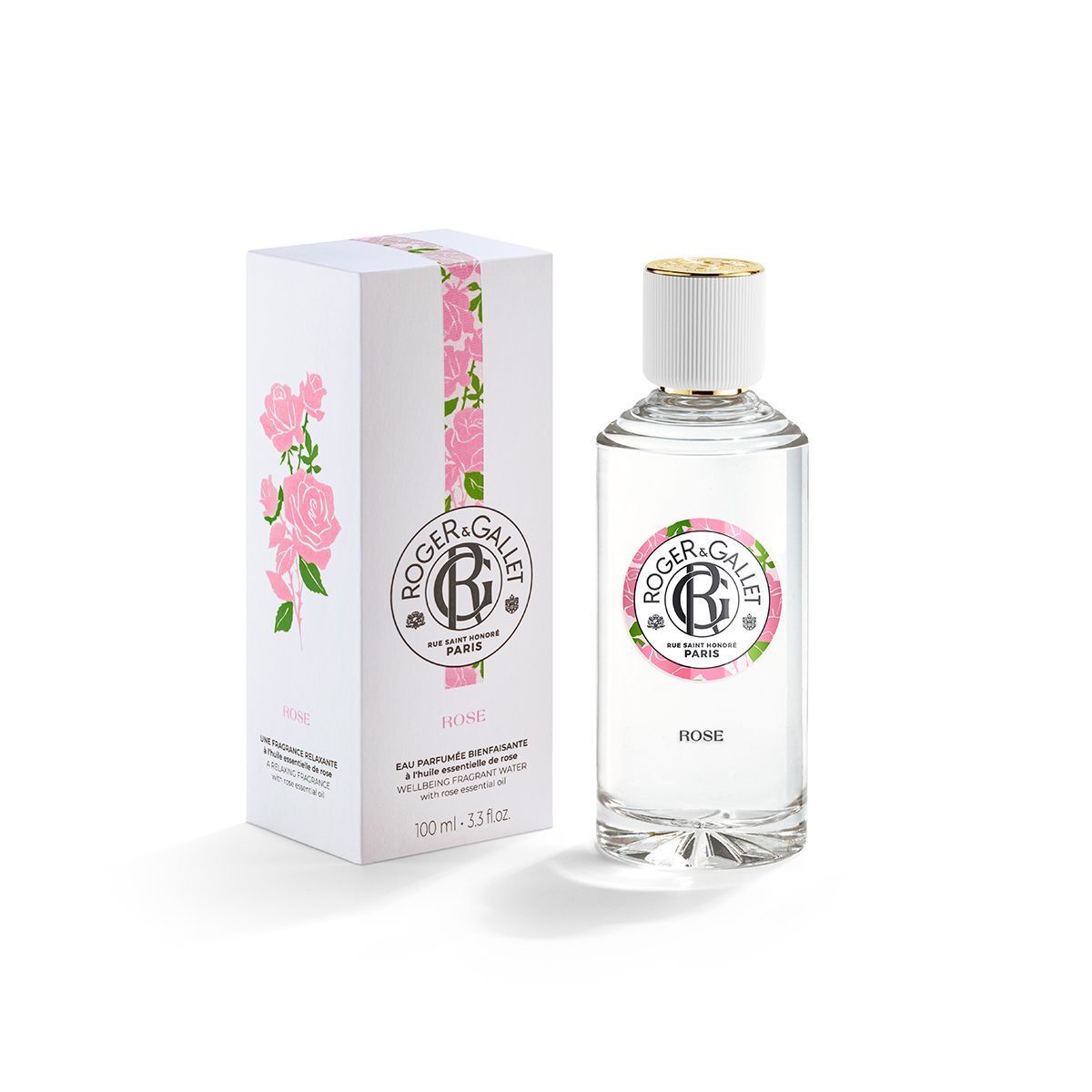 Flacone di ROGER&GALLET Rose Eau de Parfum accanto a una scatola regalo coordinata con motivo floreale.