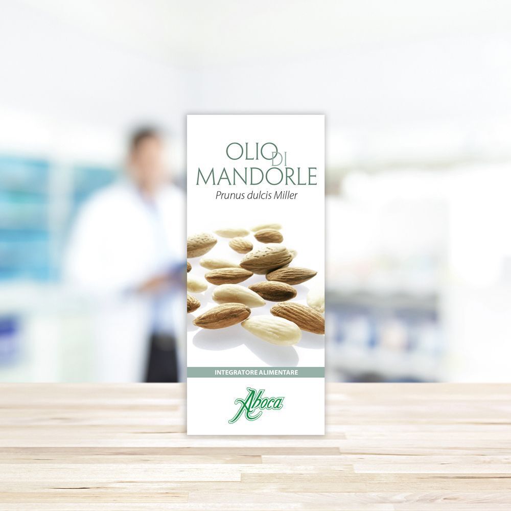 Una scatola di Aboca Olio di Mandorle Dolci con mandorle e testo sul fronte.