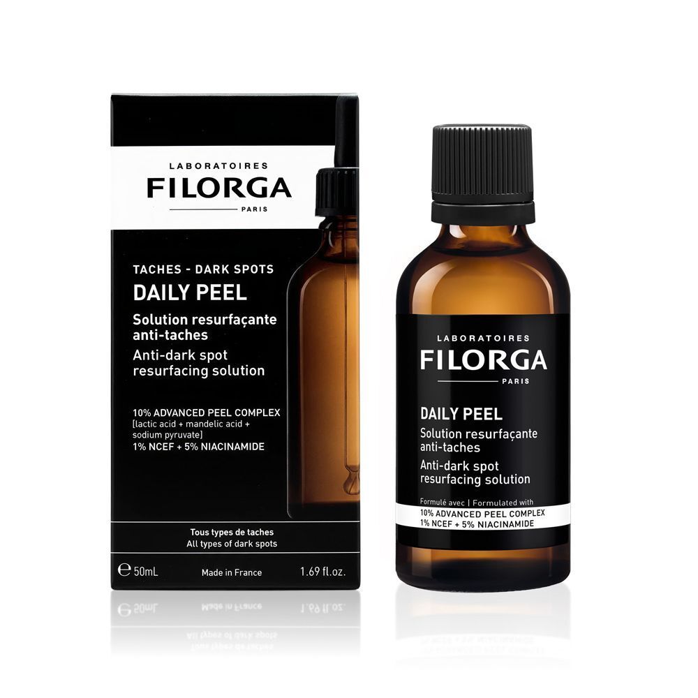 Flacone e confezione Filorga Daily Peel. Vetro ambrato, tappo nero, etichetta, scatola.