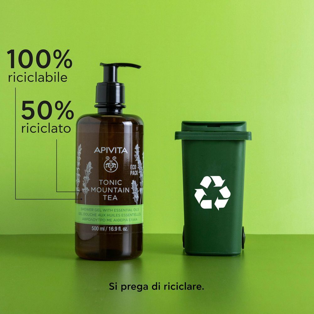 Gel doccia APIVITA TONIC MOUNTAIN TEA e un bidone di riciclaggio verde.
