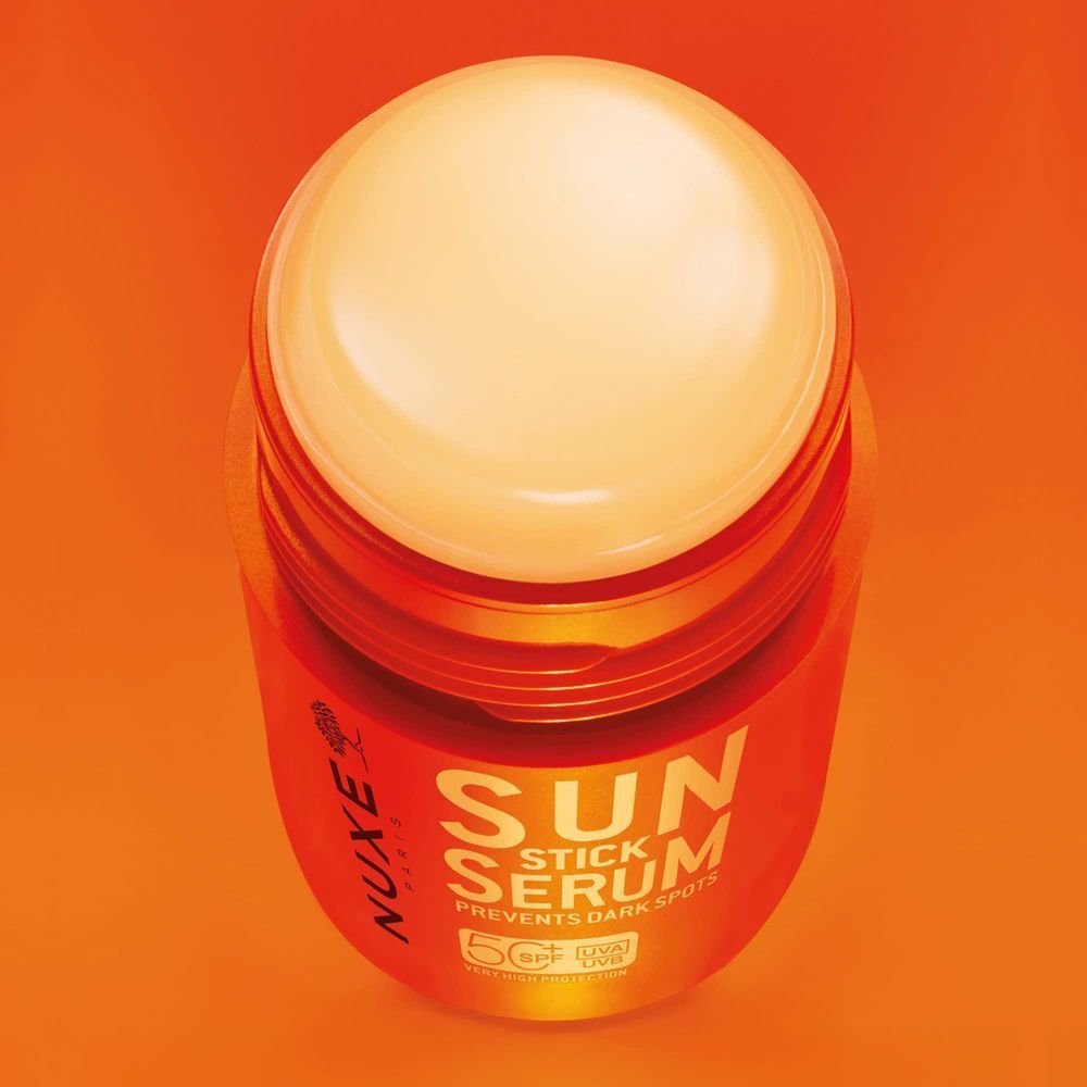 Nuxe Sun Stick Siero SPF 50 che previene le macchie scure. Vista dall'alto.