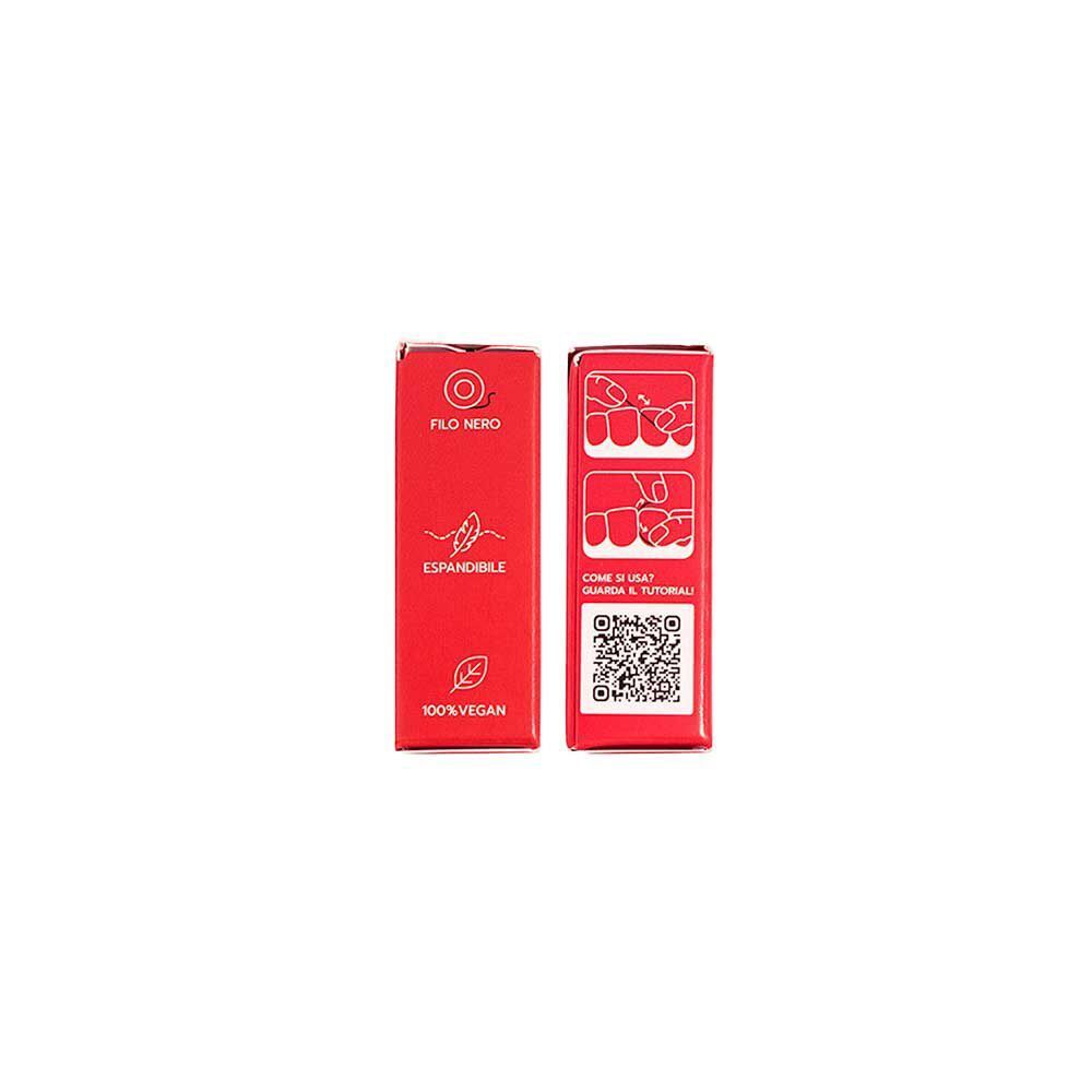 Retro di una scatola rossa di filo interdentale Geldis. Mostra istruzioni e un codice QR. 100% Vegan.