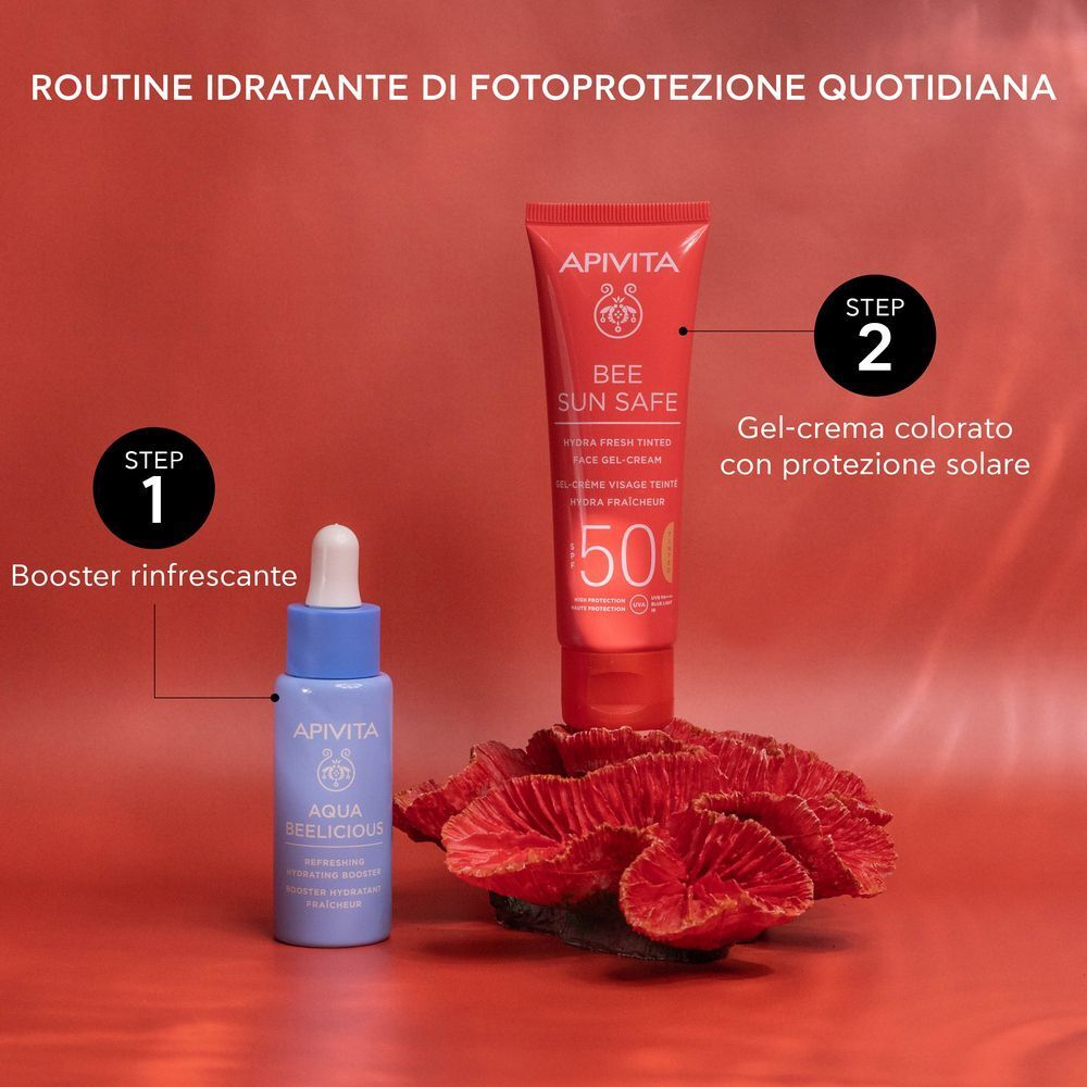 APIVITA Bee Sun Safe Gel-Crema Colorata SPF50 e un flaconcino booster per una routine quotidiana di protezione solare.