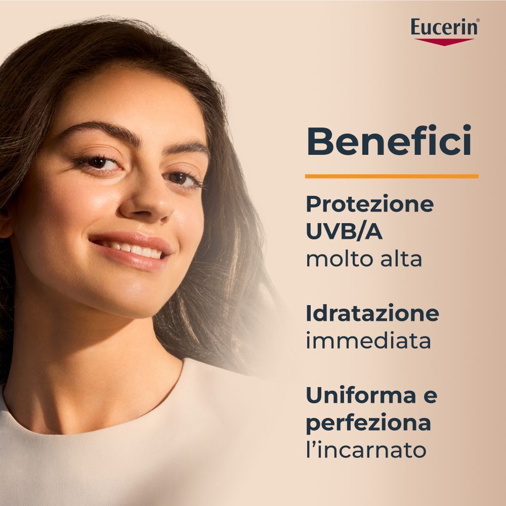 Donna con fluido Eucerin Hydro Protect: alta protezione UV, idratazione, incarnato uniforme.