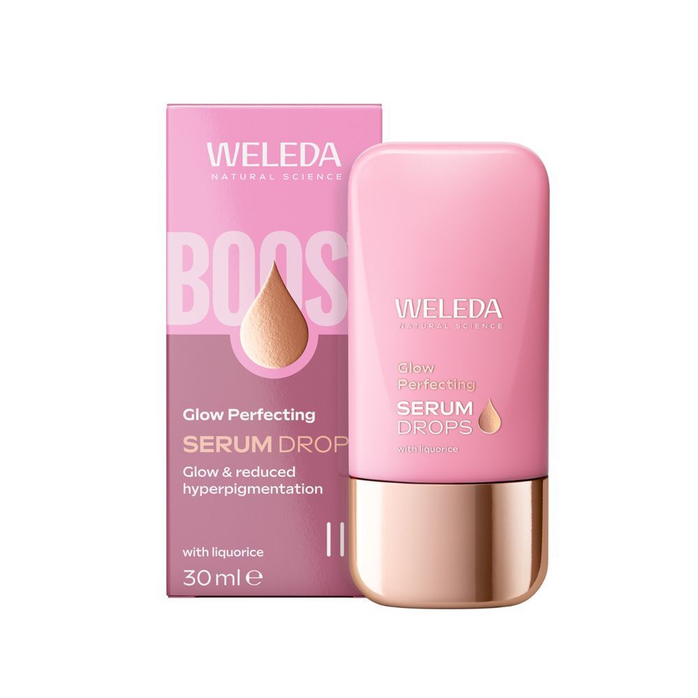 Un flacone rosa WELEDA Glow Perfecting Serum Drops accanto alla sua confezione rosa abbinata.