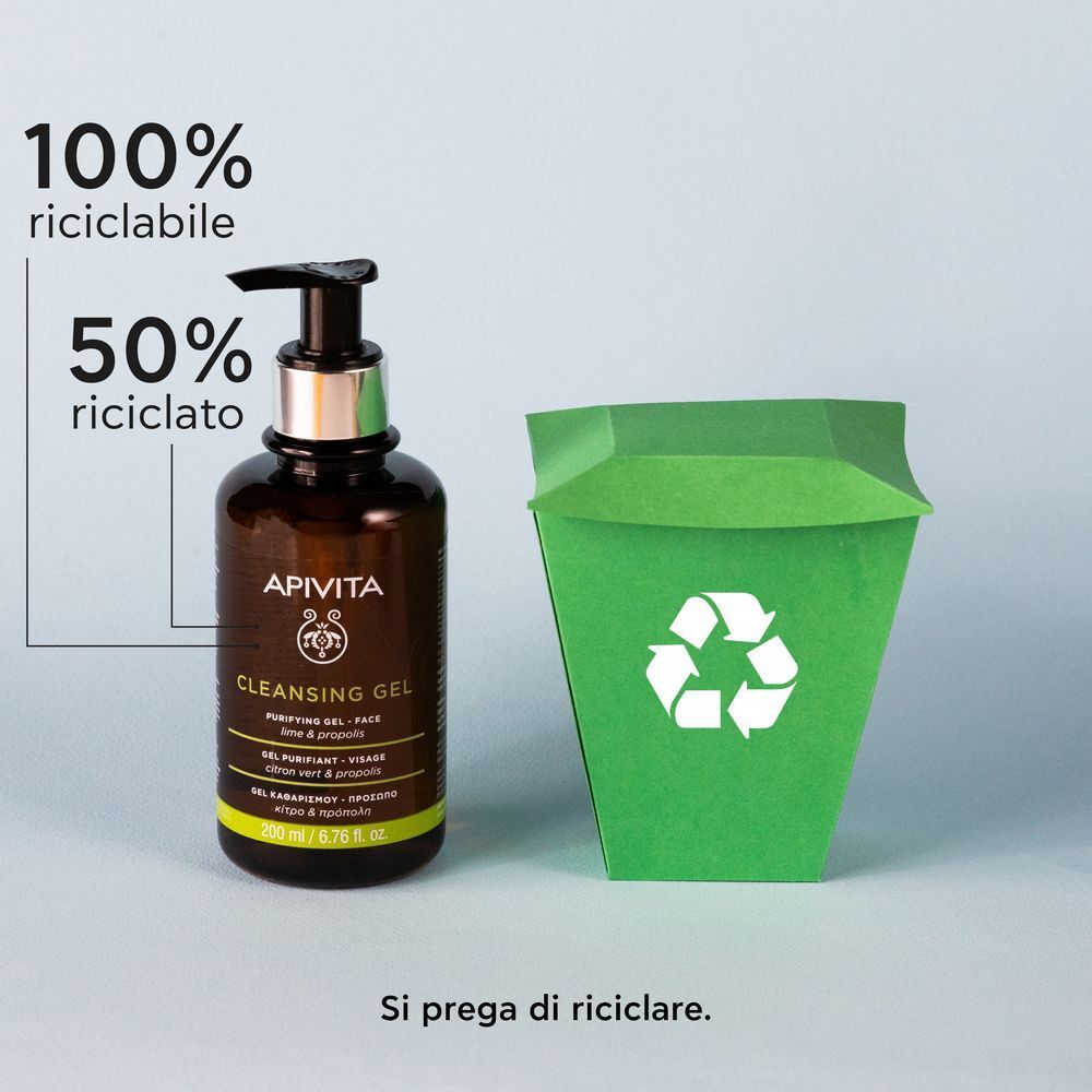 Gel Purificante APIVITA accanto a un contenitore per il riciclo verde. 100% riciclabile.