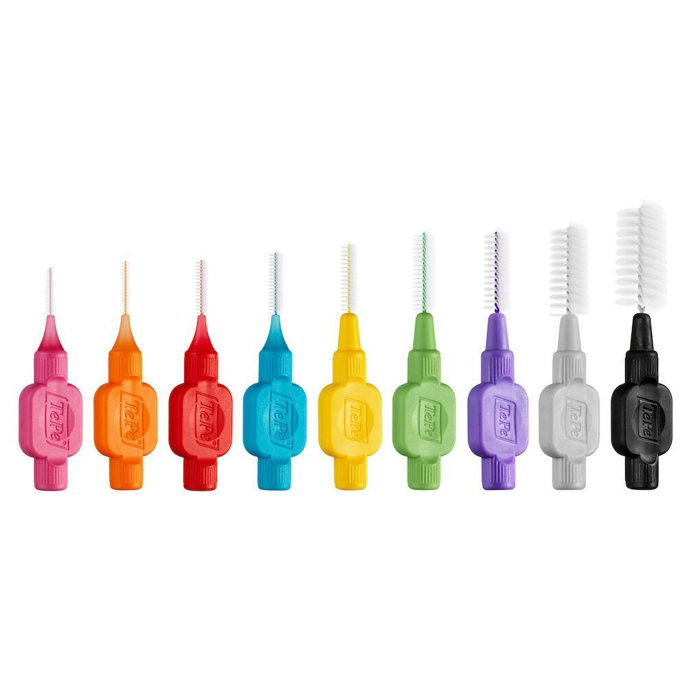 Dieci scovolini TePe di varie dimensioni e colori. Rosa, arancione, rosso, blu, giallo, verde, viola, grigio, nero.