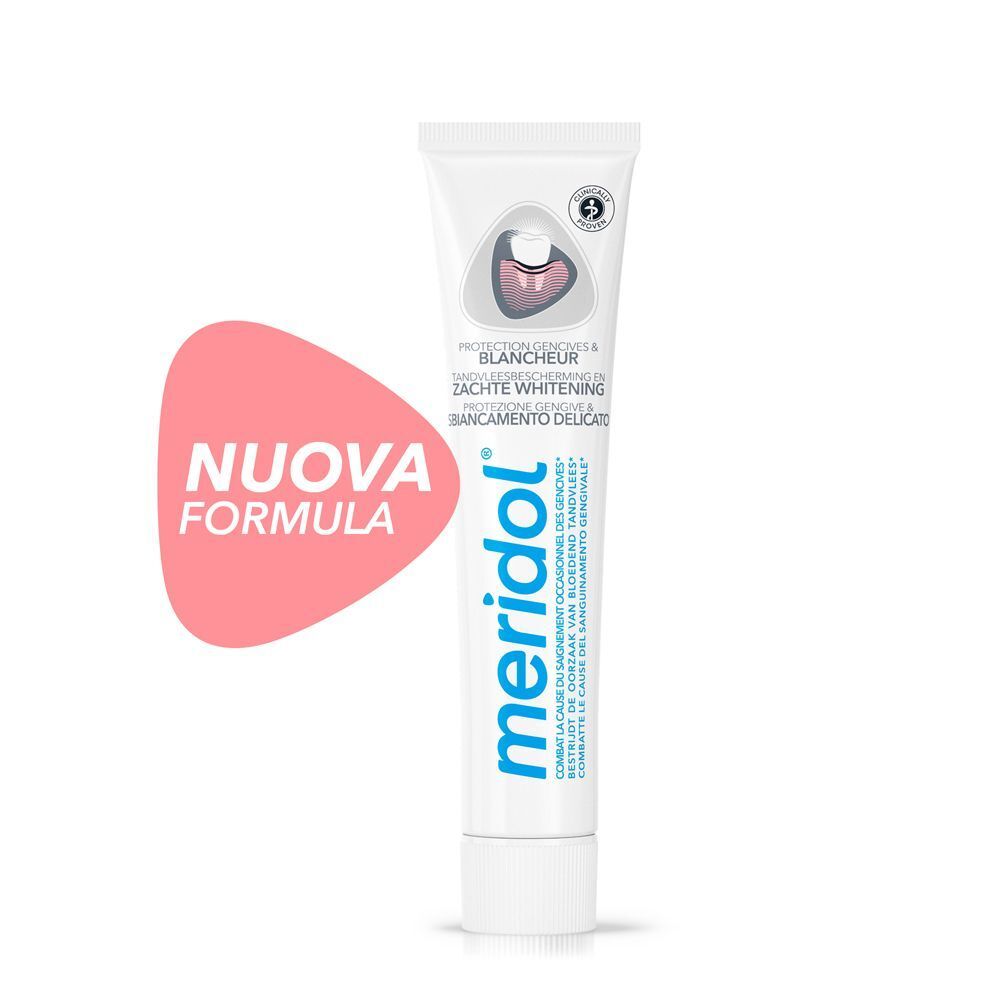 Dentifricio Meridol® Protezione Gengive Whitening in un tubetto con adesivo rosa "Nuova Formula".
