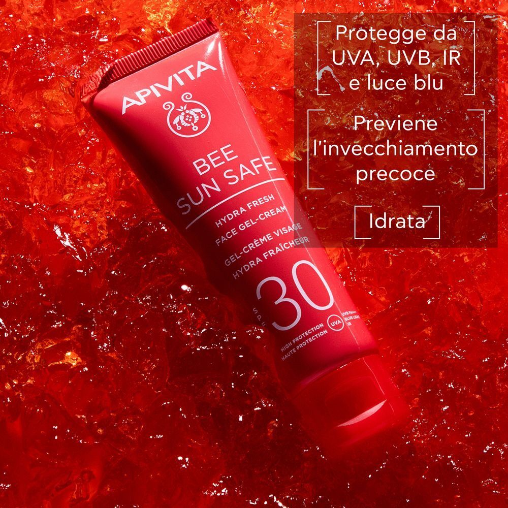 Un tubetto rosso di APIVITA Bee Sun Safe Hydra Fresh Face Gel-Cream SPF 30 in acqua rossa.