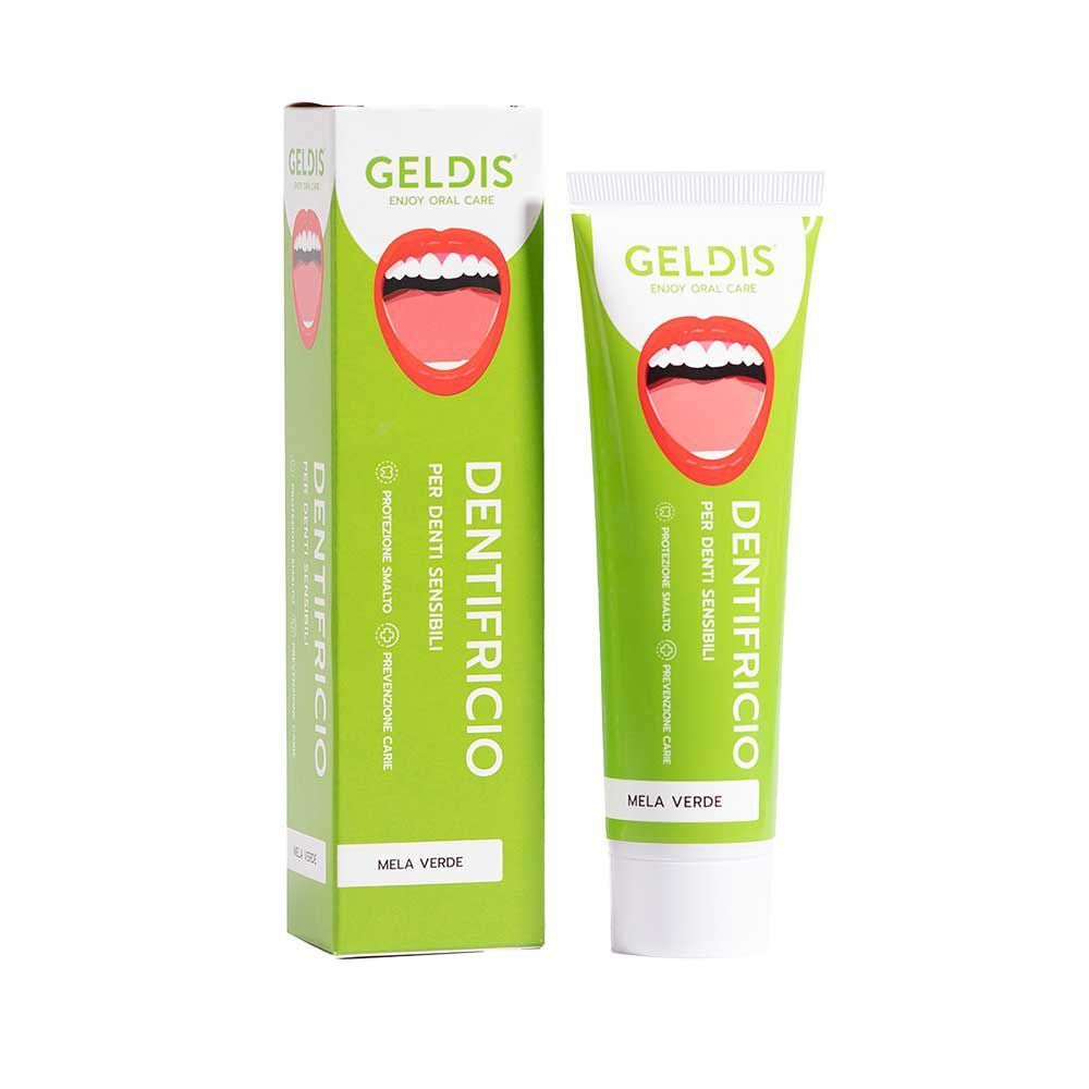 Tubetto di dentifricio verde e la sua scatola di imballaggio verde.