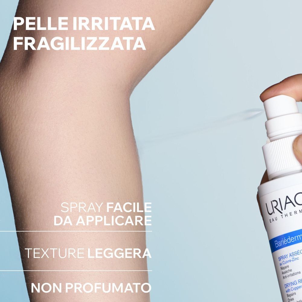 Uriage Bariéderm Cica Spray applicato su pelle irritata.