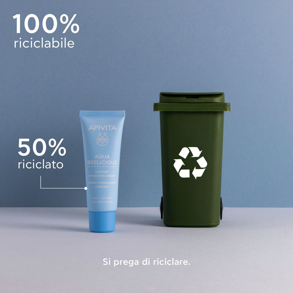Tubetto APIVITA Aqua Beelicious accanto a un bidone per il riciclaggio.