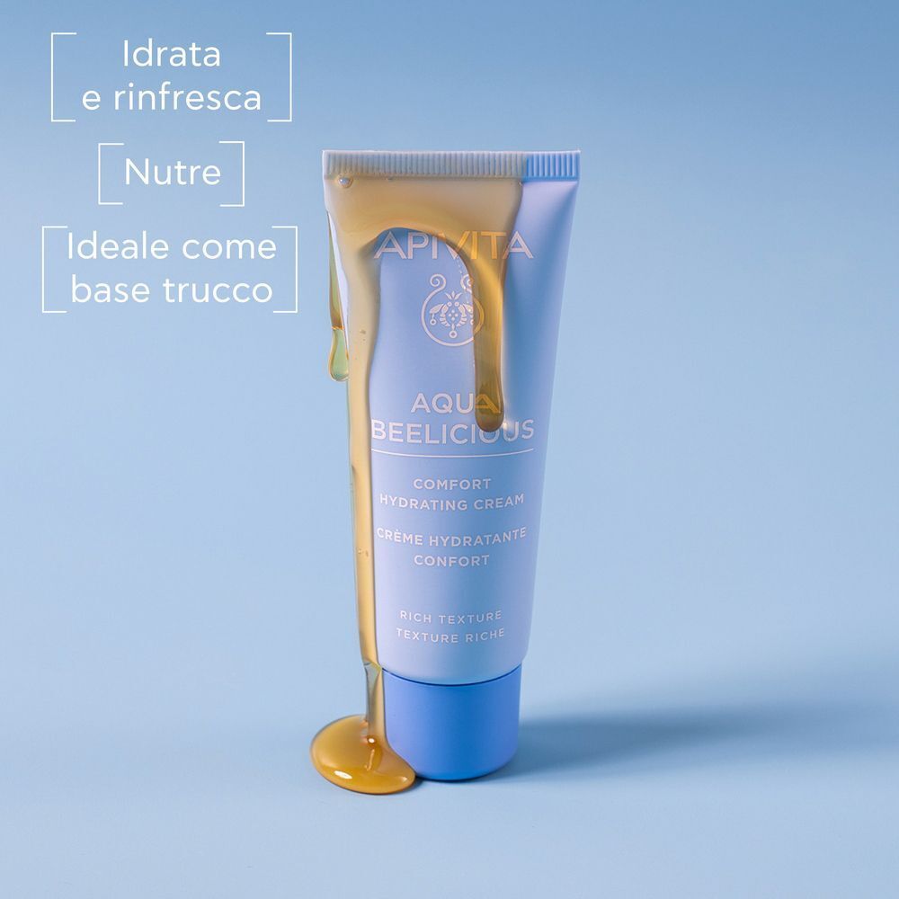 Crema idratante APIVITA Aqua Beelicious texture ricca, con miele che cola.