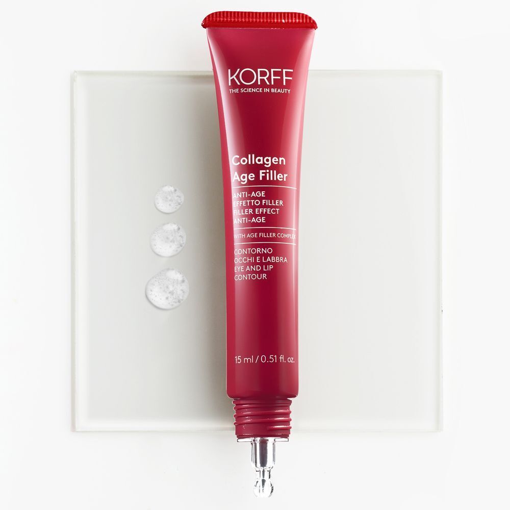 Tubetto KORFF Collagen Age Filler su una lastra di vetro con gocce.
