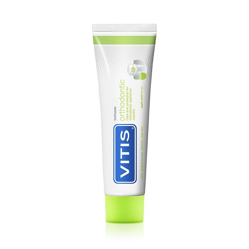 Dentifricio Vitis Orthodontic in tubetto. Tubo bianco con scritte blu e verdi.