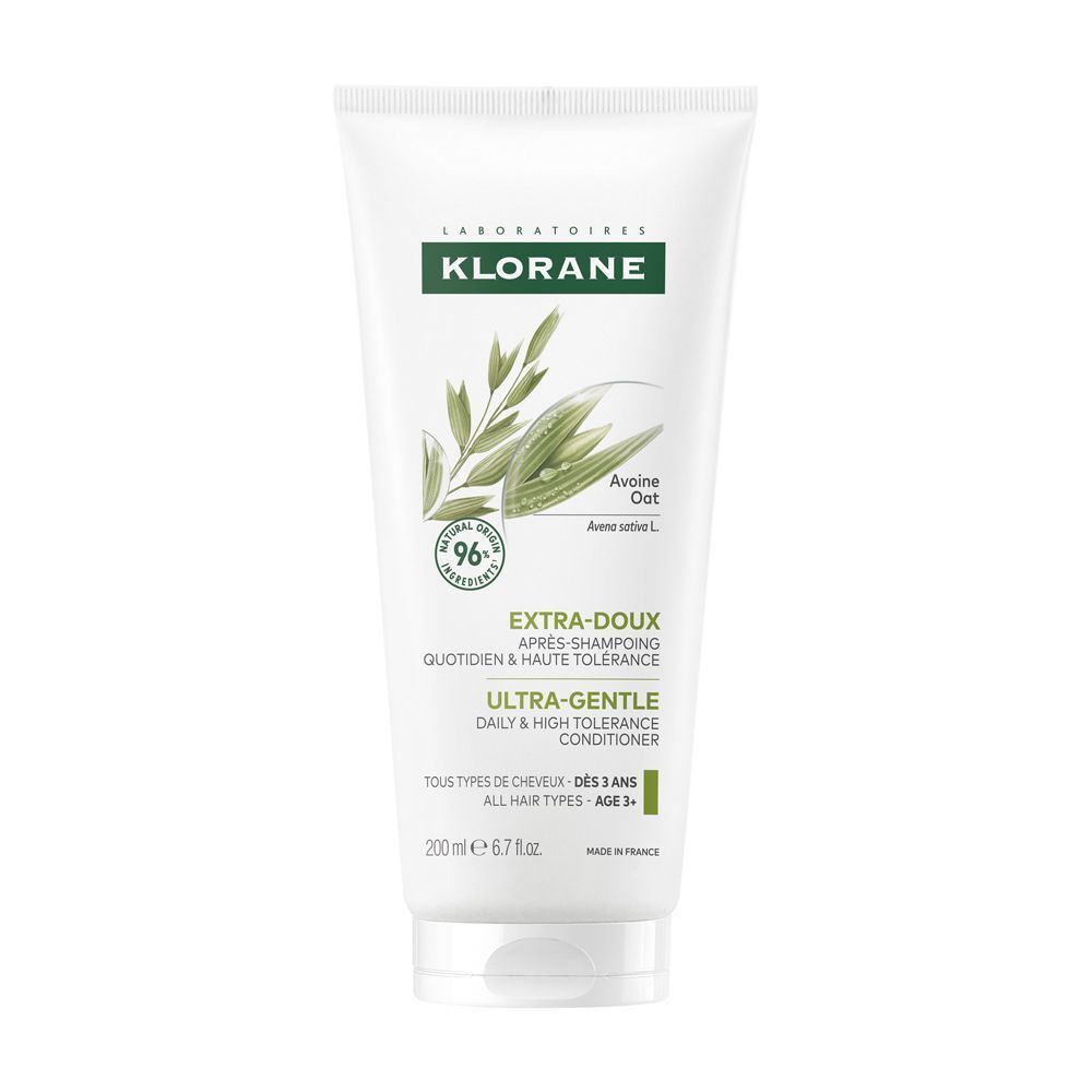 Tubo bianco Balsamo Klorane con motivo avena, testo 'Ultra-Gentle Daily & High Tolerance Conditioner'.
